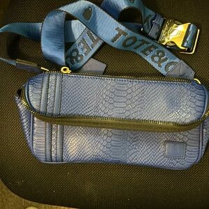 Small blue crossbody tote and carry bag